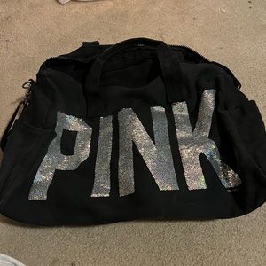 Black duffle bag from pink